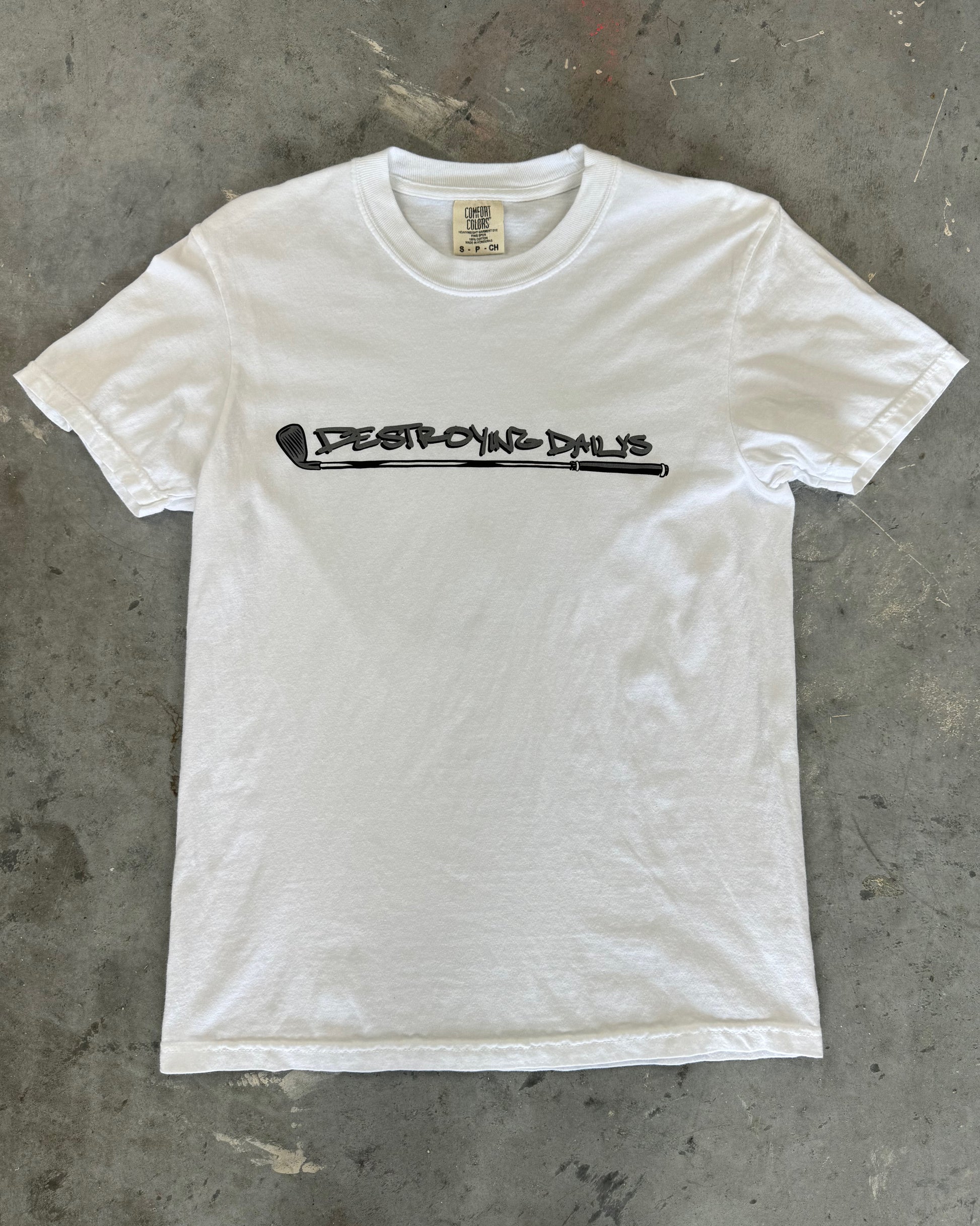 front view of White 100% cotton t-shirt featuring a hand-drawn crashed Golf GTI on a golf course with the text "Fore! Destroying Dailys," perfect for car enthusiasts.