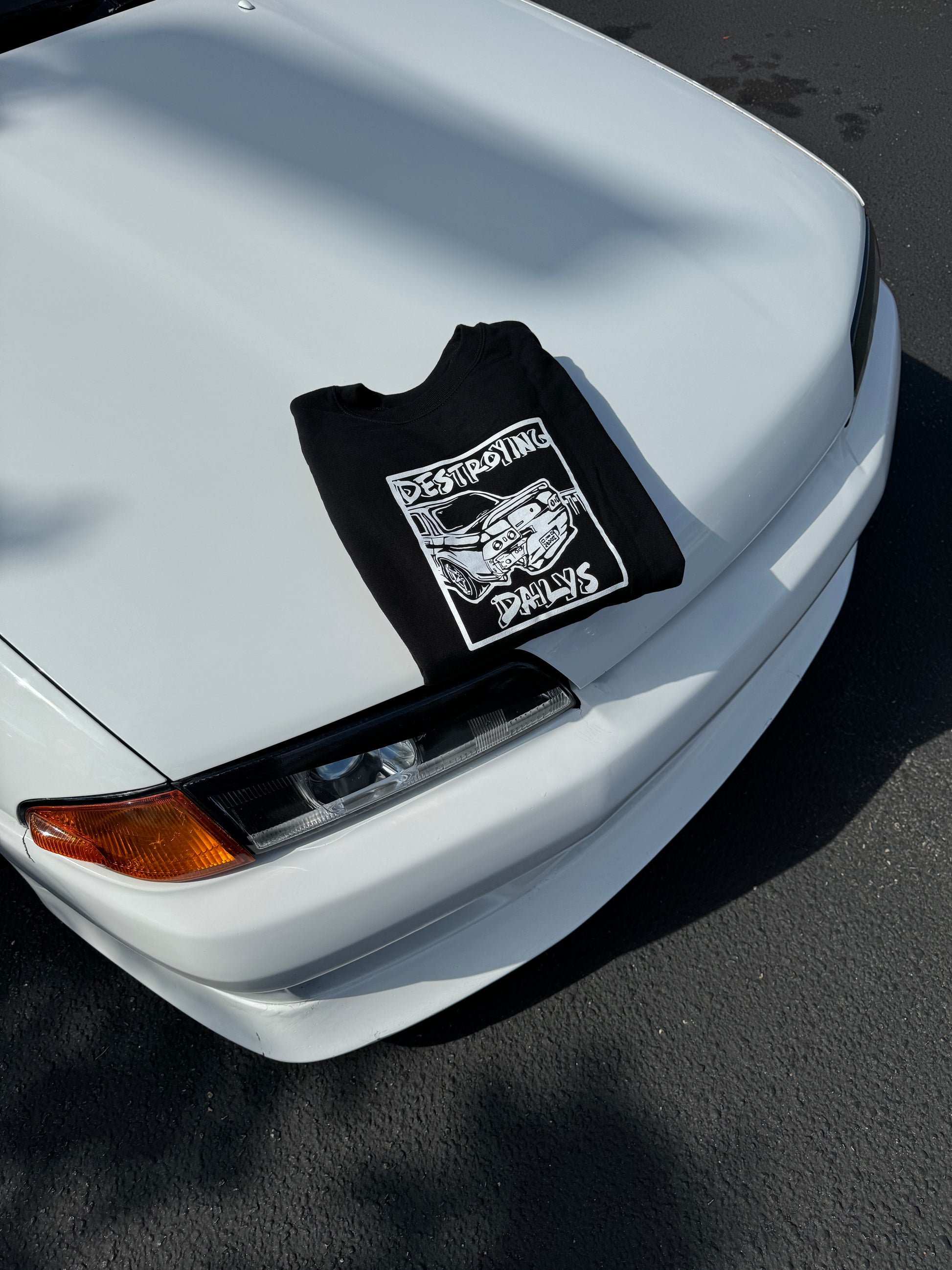  Black crewneck sweatshirt made of 50/50 cotton and polyester blend featuring a hand-drawn JDM Skyline R32 with the text "Destroying Dailys," perfect for car enthusiasts. JDM sweatshirt for car guys, Nissan Skyline sweatshirt on nissan skyline