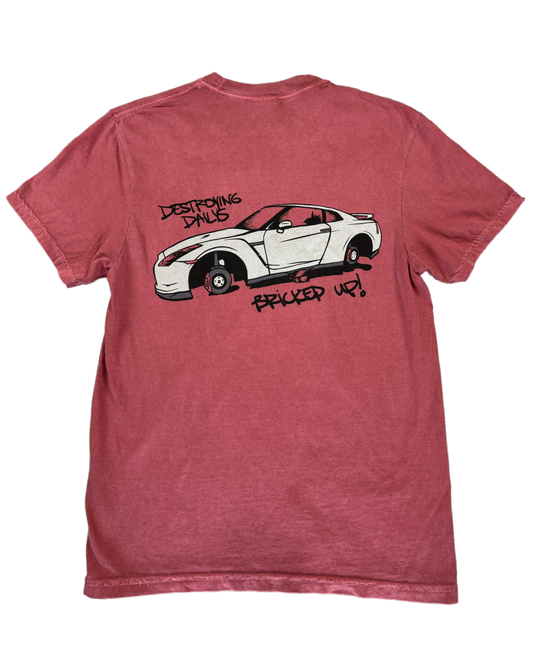 Red 100% cotton t-shirt featuring a hand-drawn Nissan GTR on bricks with the text "Destroying Dailys Bricked Up!" perfect for JDM enthusiasts. Funny Tee for Car guys