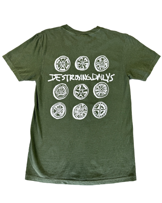 Green 100% cotton t-shirt featuring hand-drawn JDM wheels and the text "Destroying Dailys" on the back, perfect for JDM fans and car enthusiasts.